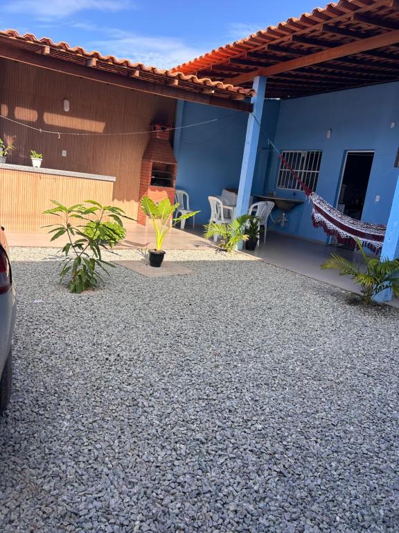 a patio outside of a house with a building at Casa Morada Nobre2 in Barreirinhas