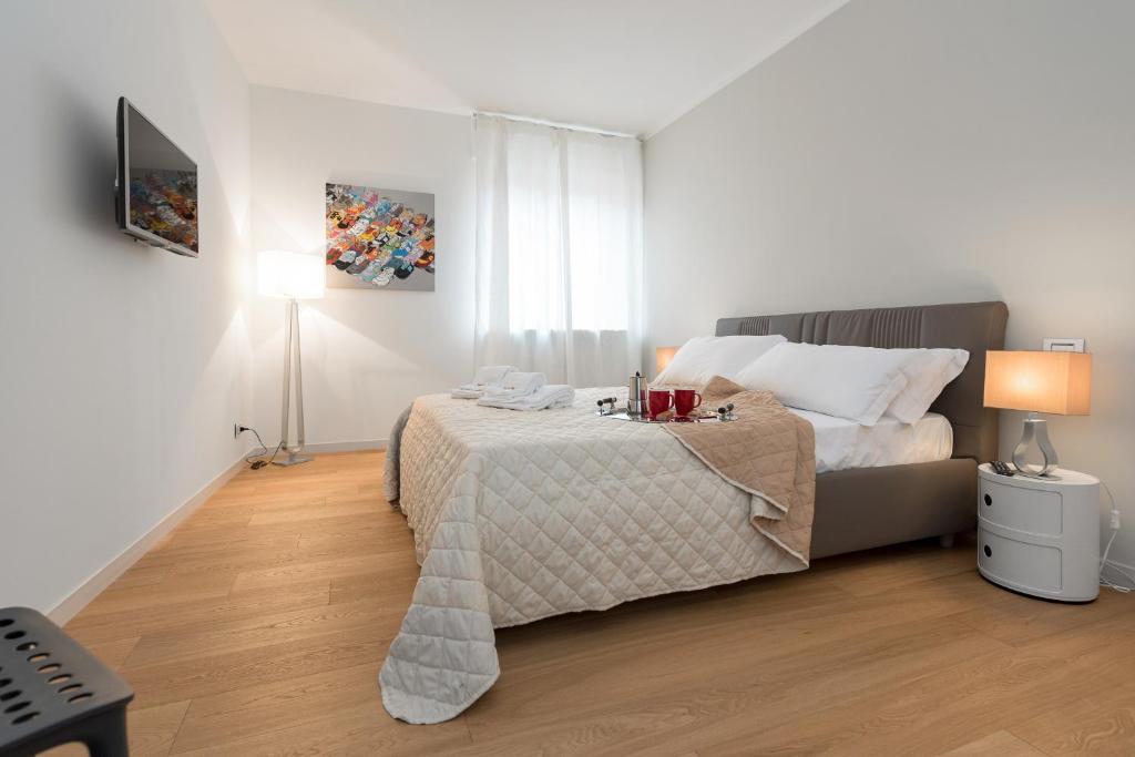 Posteľ alebo postele v izbe v ubytovaní Flats4rent