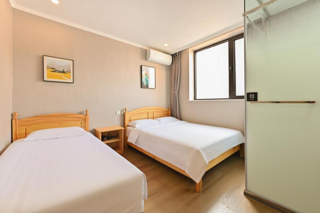 Beijing Xingshe Youth Hostel - Camera Tripla