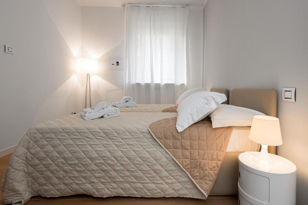 Posteľ alebo postele v izbe v ubytovaní Flats4rent