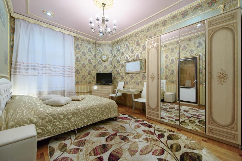 Ένα ή περισσότερα κρεβάτια σε δωμάτιο στο Apartment Rubinshteyna 15