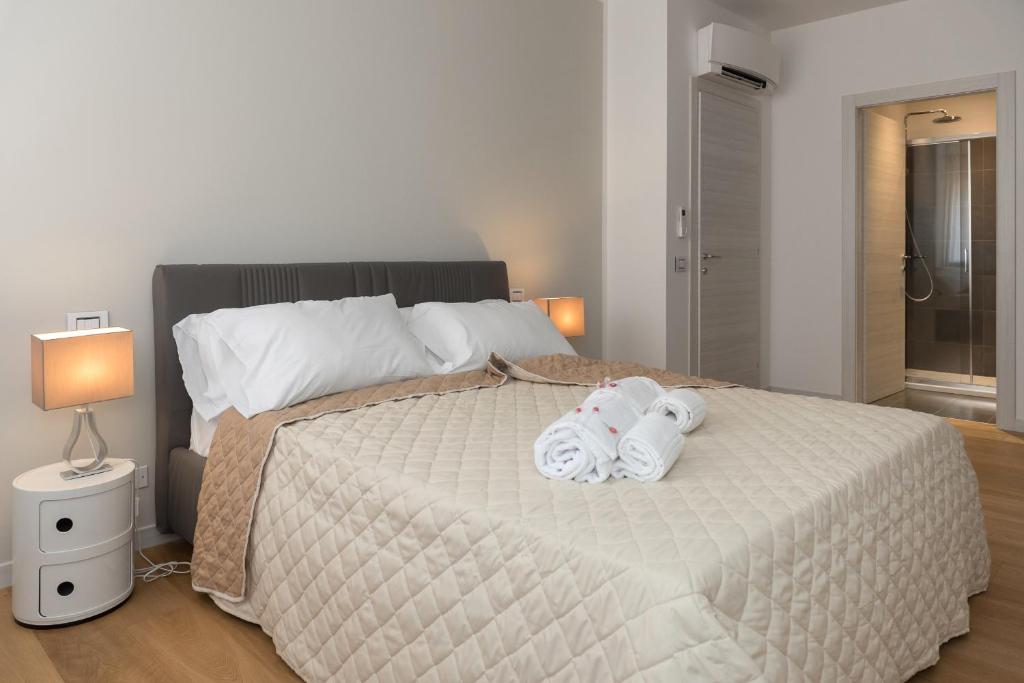 Posteľ alebo postele v izbe v ubytovaní Flats4rent
