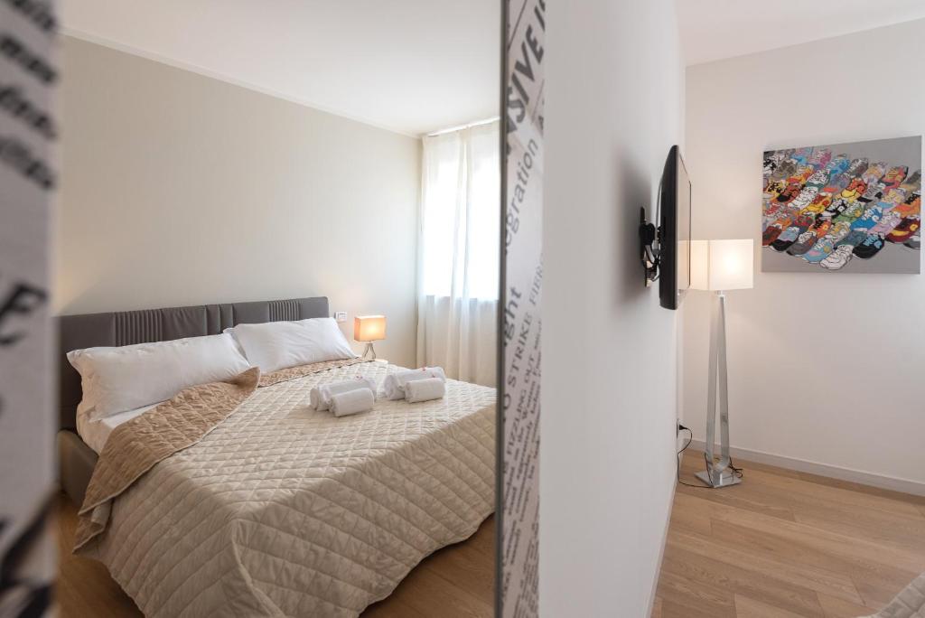 Posteľ alebo postele v izbe v ubytovaní Flats4rent
