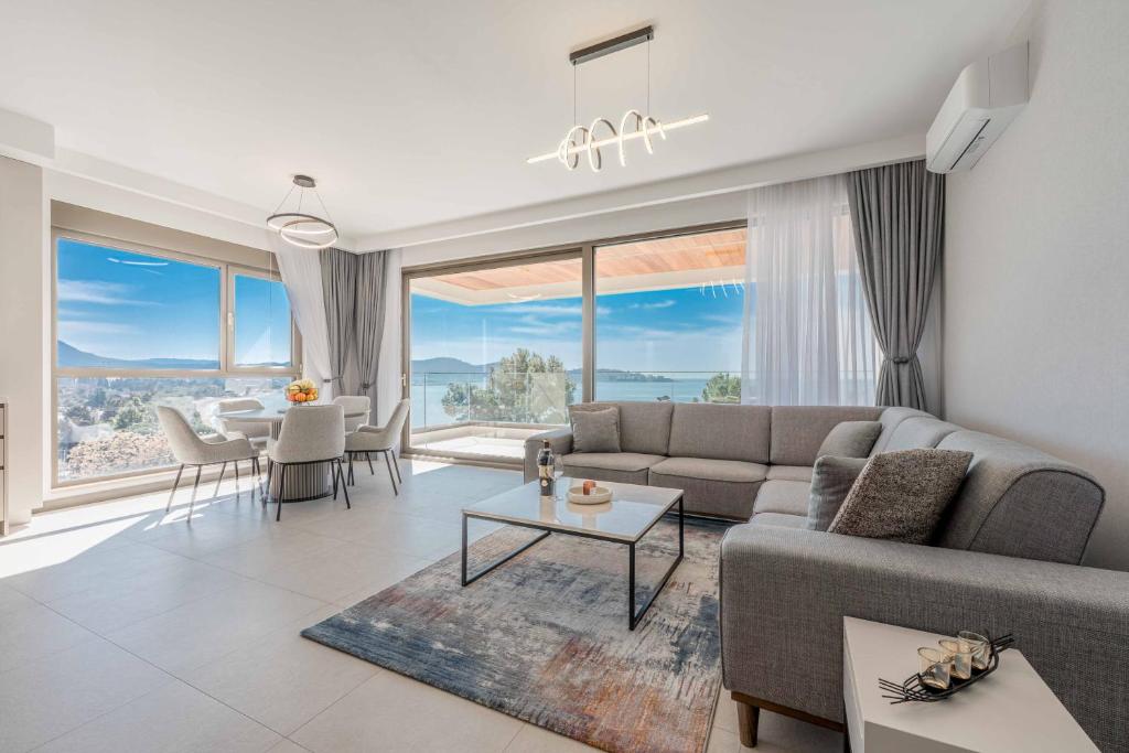 a living room with a couch and a table at SeaLine Residence in Bar