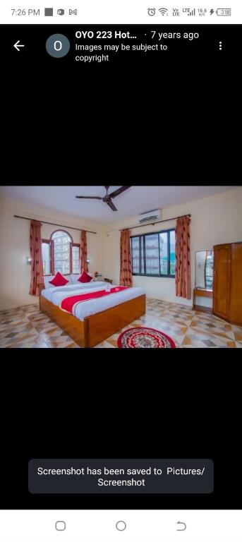 a picture of a bedroom with a bed in a room at Hotel Bien Venue in Pokhara