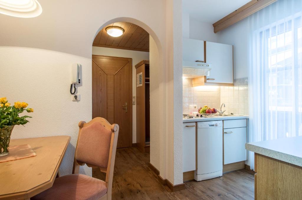 Kuchyň nebo kuchyňský kout v ubytování Apart Granada