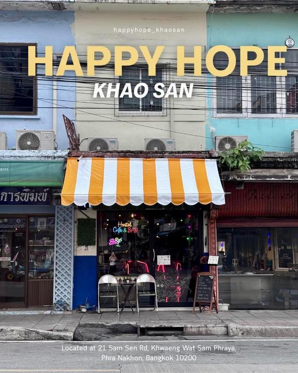 a happy hope khaos san sign on the side of a store at Happy Hope Khao San in Bangkok