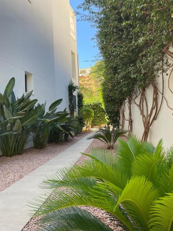 Private Garden Retreat with Pool, Walk to Beach