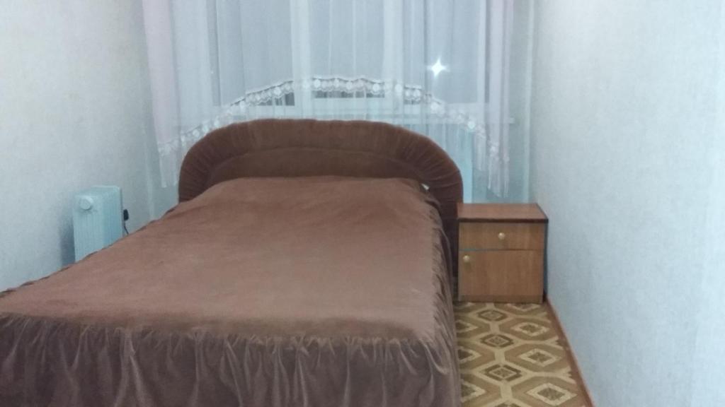 Postel nebo postele na pokoji v ubytování Hotel Yuvileyny