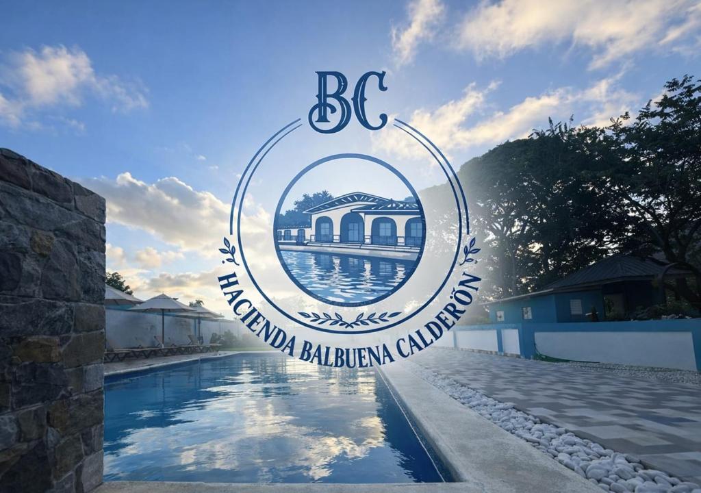 a sign for a swimming pool at a resort at Balbuena Countryside Villa with Private Pool in San Felipe de Puerto Plata
