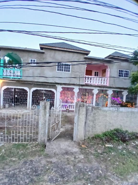 a house with a fence in front of it at Nice vacation stay in Salt Gut Pen