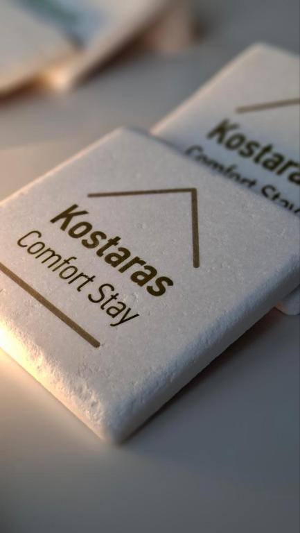 a close up of a piece of metal with the words restricted dividends at Kostaras Comfort Stay in Dispilio