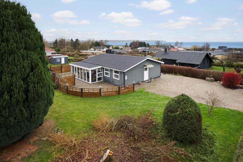 an aerial view of a house in a yard at FY403-Asperup-Eskelundsvaenget-1 in Båring