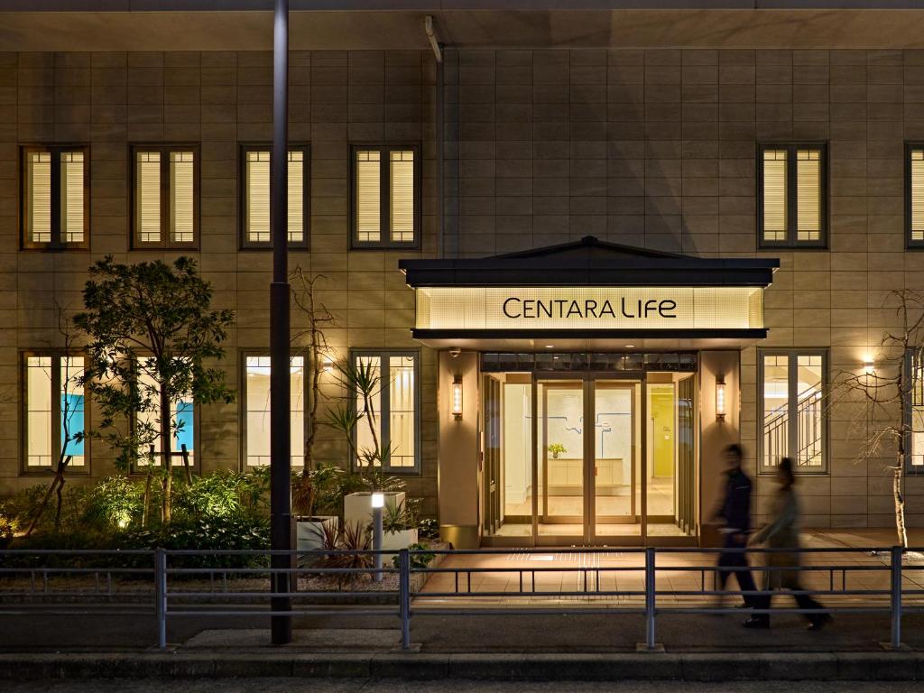 a building with a sign that reads central life at Centara Life Namba Hotel Osaka in Osaka