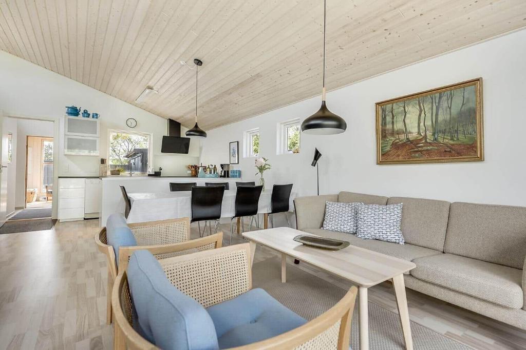 a living room with a couch and a table at 30140-Malling-Askvaenget-5 in Malling
