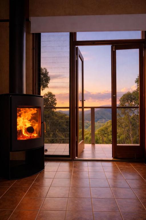 a fireplace in a room with a view at The Odd Frog in Bright