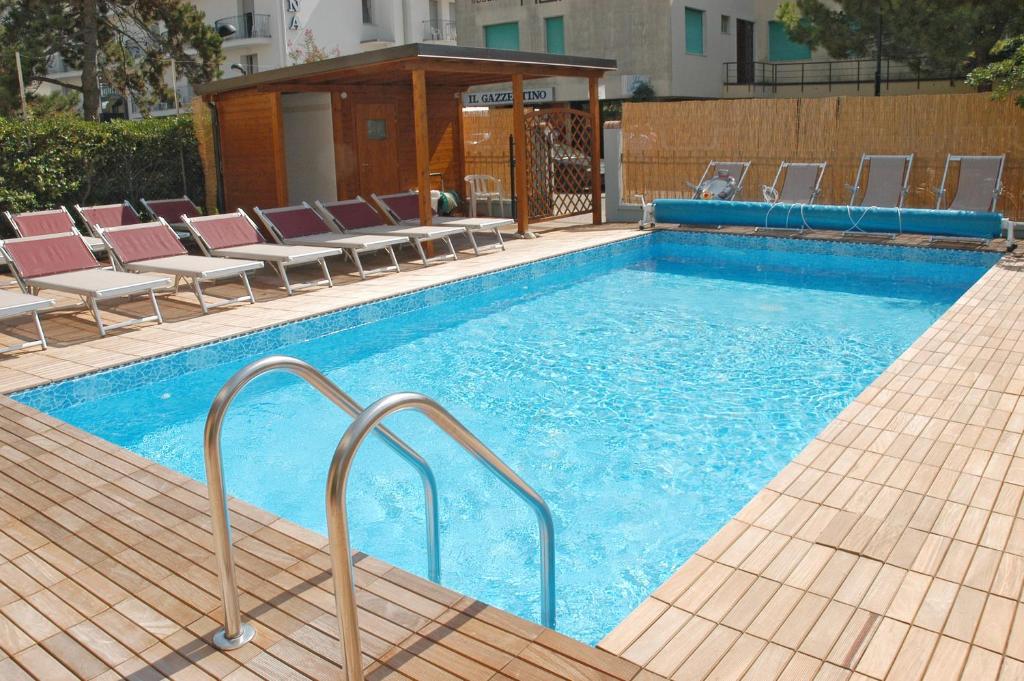 Бассейн в Appartamenti Mare Caorle или поблизости