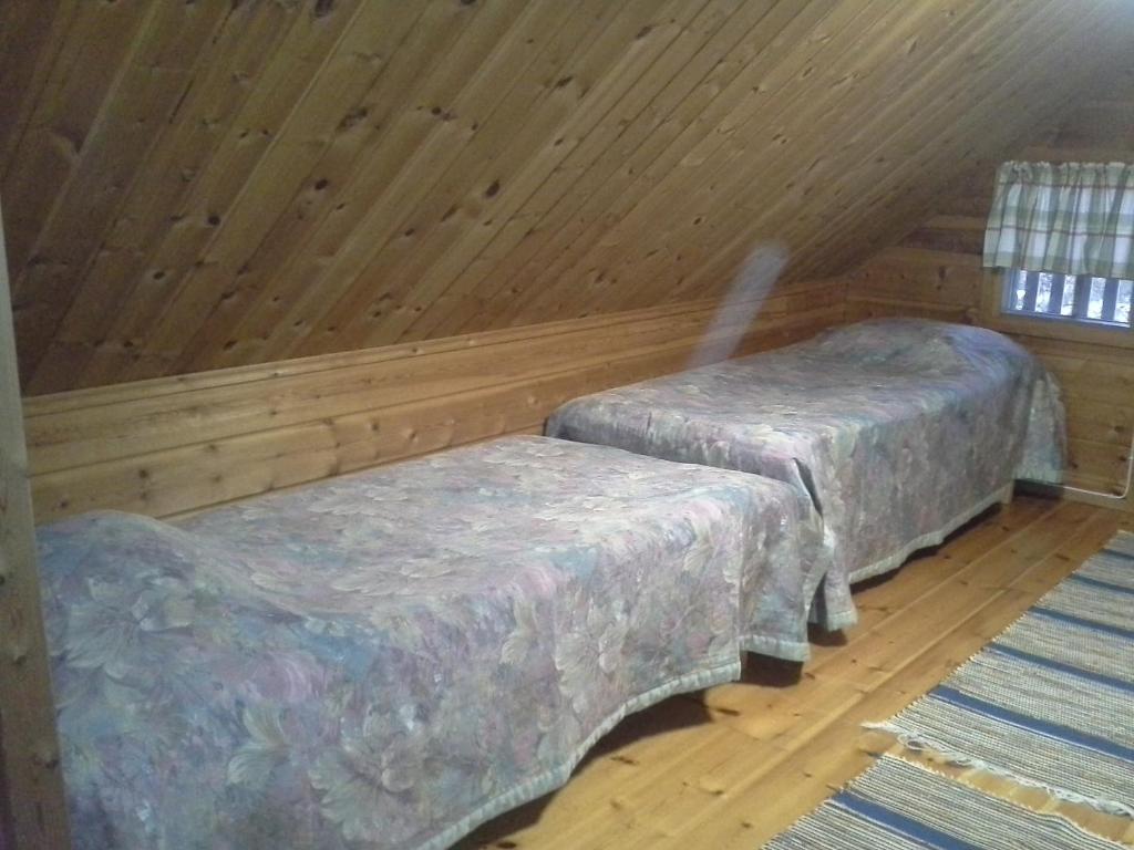 Postel nebo postele na pokoji v ubytování Vipati Cottage