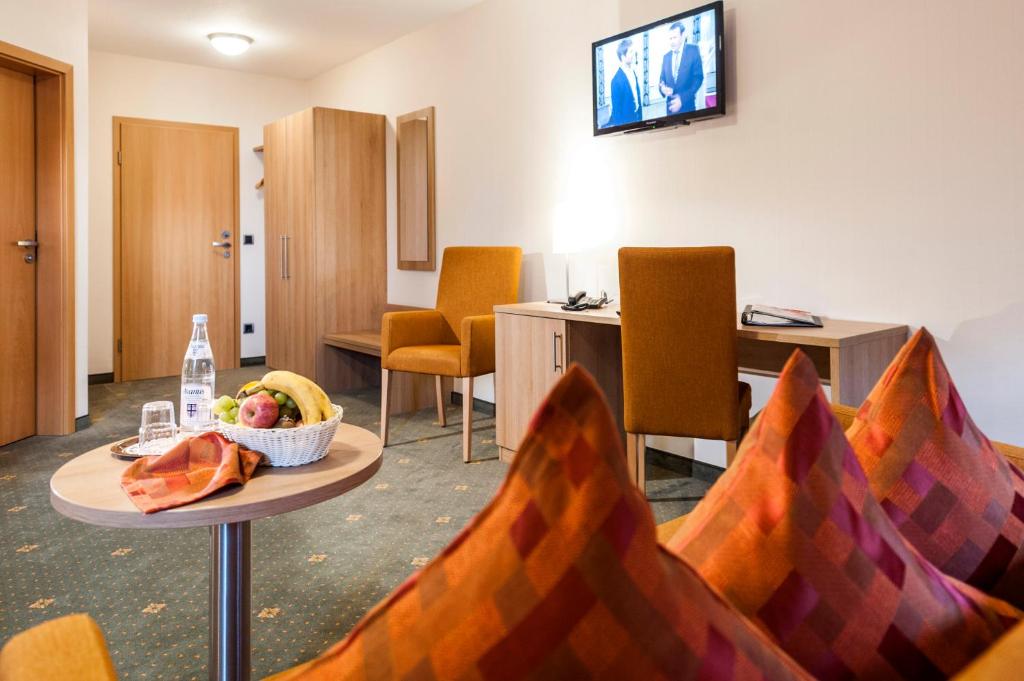 TV a/nebo společenská místnost v ubytování Hotel Hilker