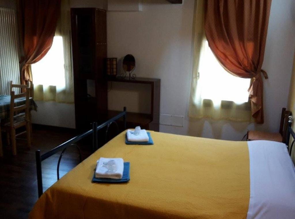 Postel nebo postele na pokoji v ubytování B&B Vaca Mora