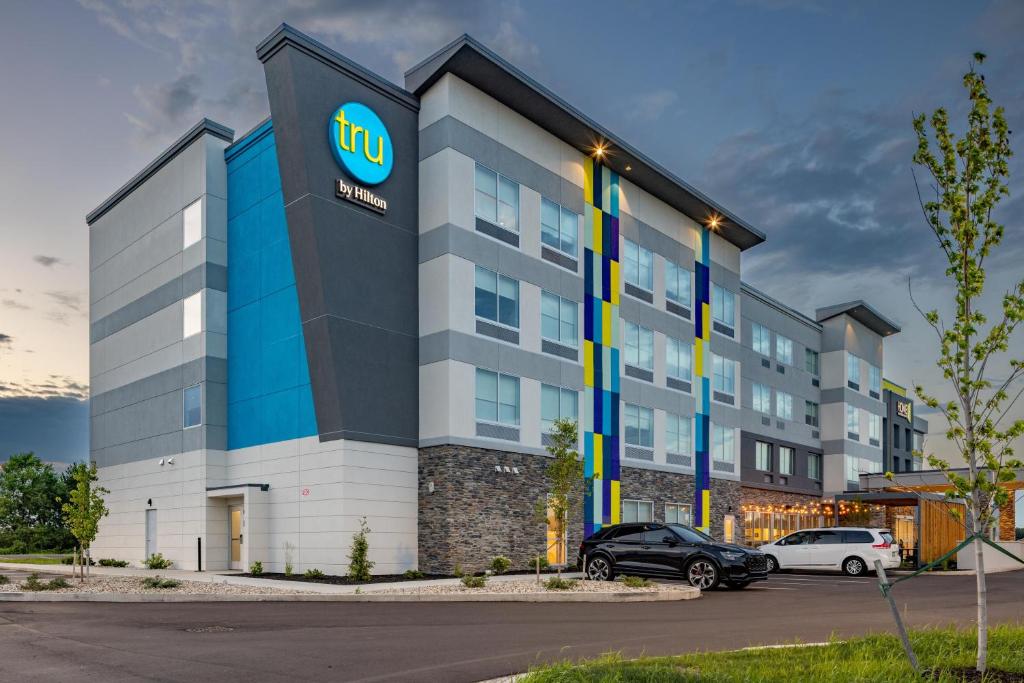 a building with a intel sign on the side of it at Tru By Hilton Kalamazoo in Kalamazoo