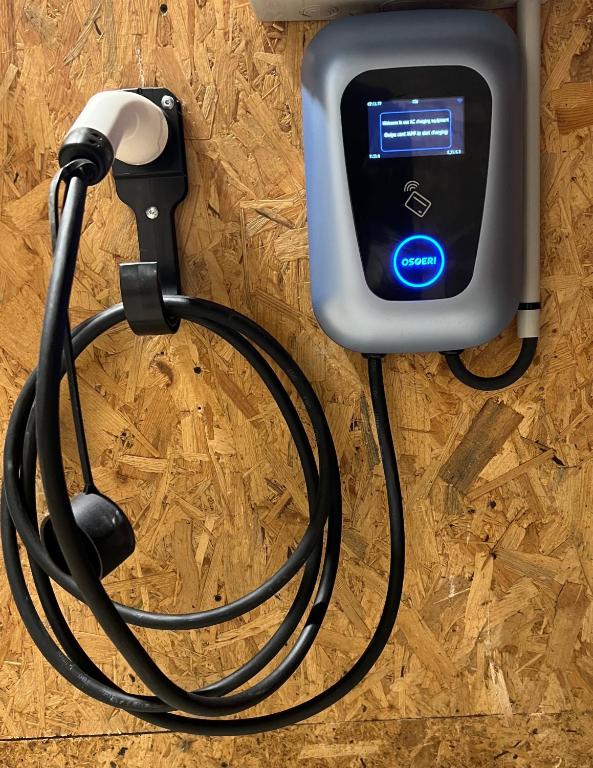 an electronic device hooked up to a charger at Au point du jour Ch2 in Récourt-le-Creux