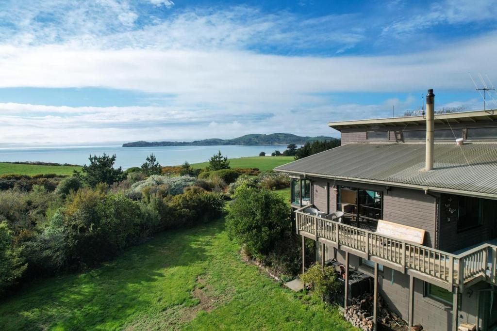 an aerial view of a house with a balcony at Hampden Heaven in Hampden