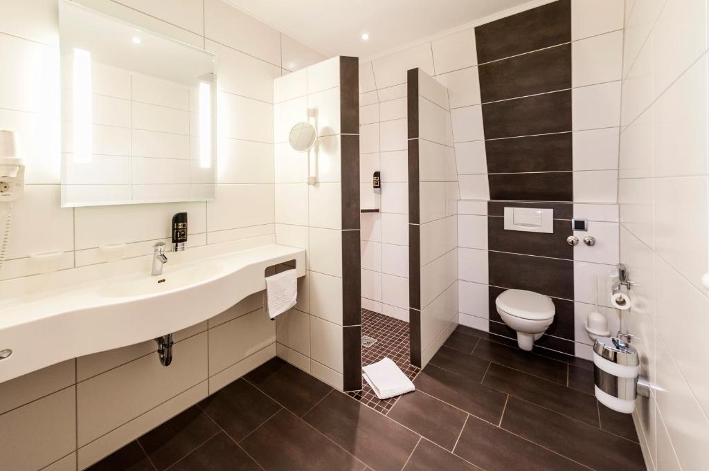 Koupelna v ubytování Hotel Hilker