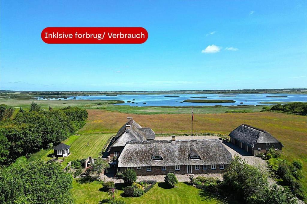 an aerial view of an old house in a field at 20033-Ulfborg-Vesterhavsvej-15 in Ulfborg
