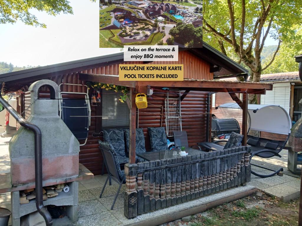 an old train station with a sign on it at Aqualuna Petrov brlog in Podčetrtek