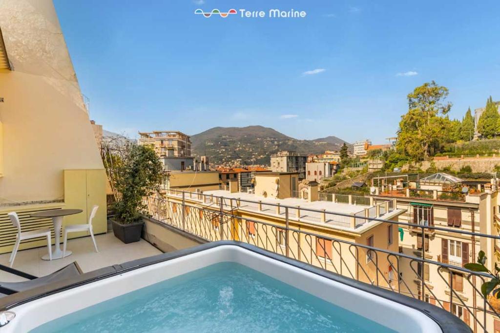 a balcony with a swimming pool on top of a building at Suite Level 8, Terre Marine in La Spezia
