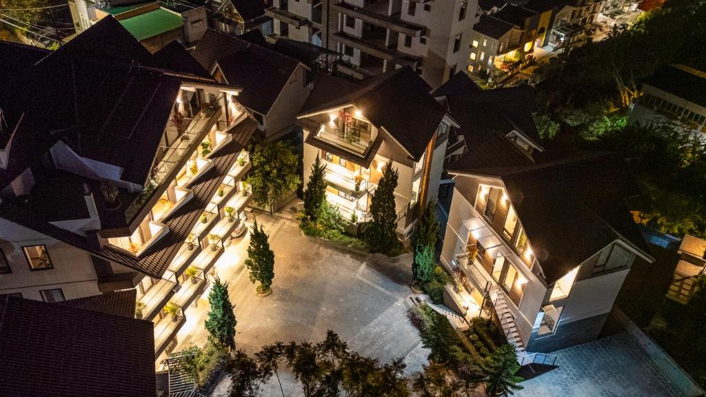 an aerial view of a building at night at Zenora Hillside Garden in Da Lat