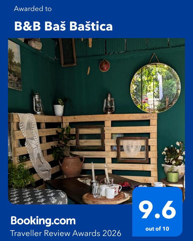 a poster for a bbq bash backstage with a table and plants at B&B Baš Baštica in Kladovo