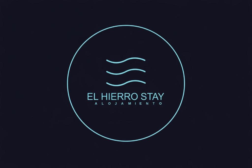a circle logo with a wave in the middle at El HierroStay Appartments - La Chalana & El Remo in La Restinga