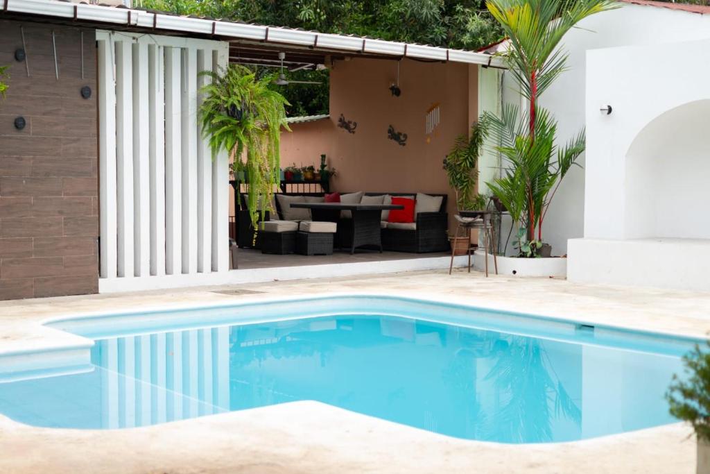 a swimming pool in the backyard of a house at Casa Vidalta in San Sebastián