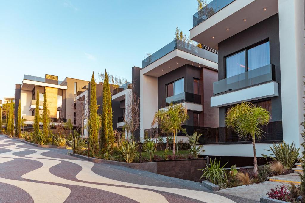 a rendering of a building with a courtyard with plants at Sael Privè in Golem