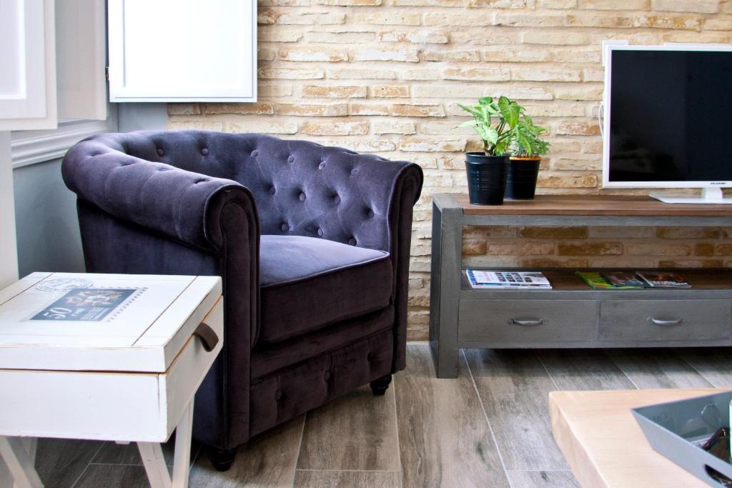 TV a/nebo společenská místnost v ubytování La Casa del Conde Ybarra
