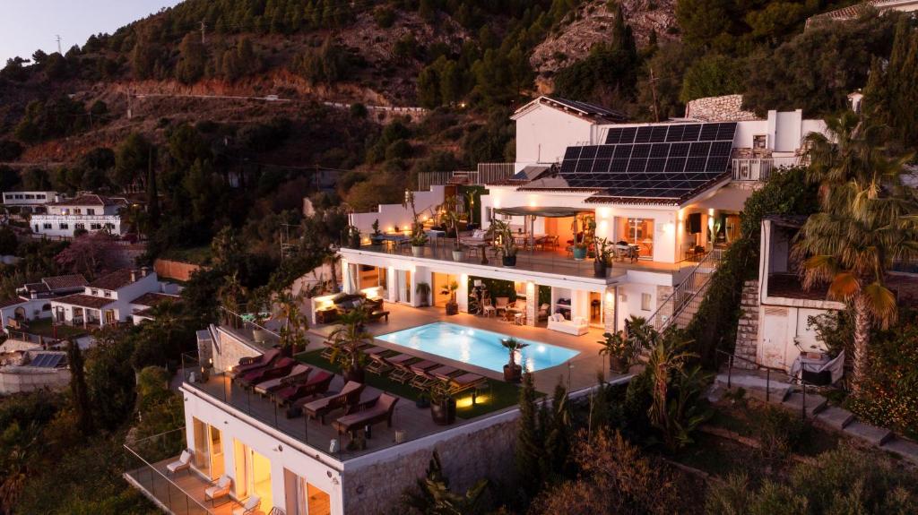 an aerial view of a house with a swimming pool at Villa Maya Bali Inspired Villa in Mijas