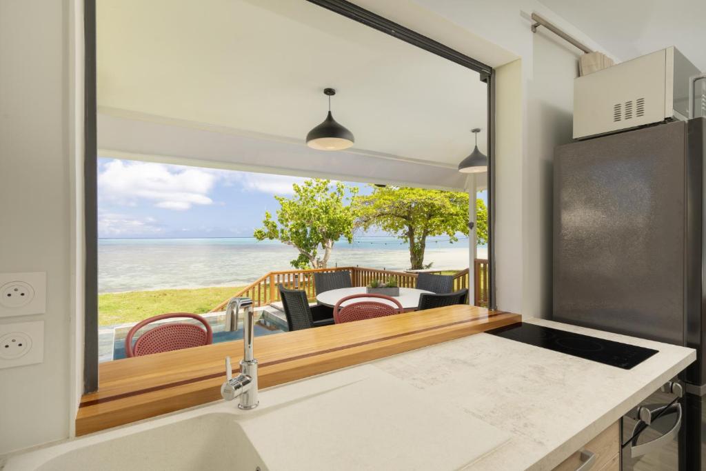 Raina Lodge Moorea Haapiti - Fare Keali'i - Piscine privée - Vue plage et Lagon - photo 4 - Moorea, Polynésie