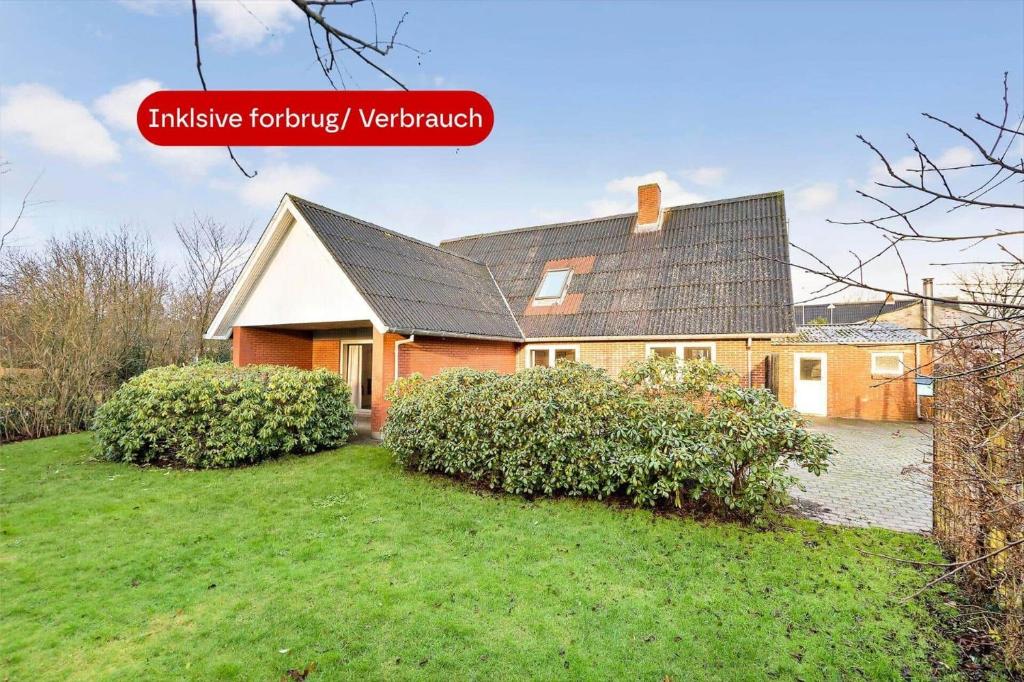 a house with a large yard in front of it at 10253-Ulfborg-Sognegardsvej-13 in Ulfborg
