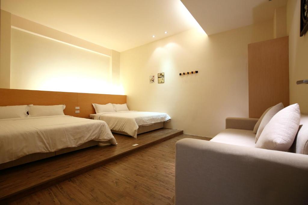 Una cama o camas en una habitación de Richie Homestay