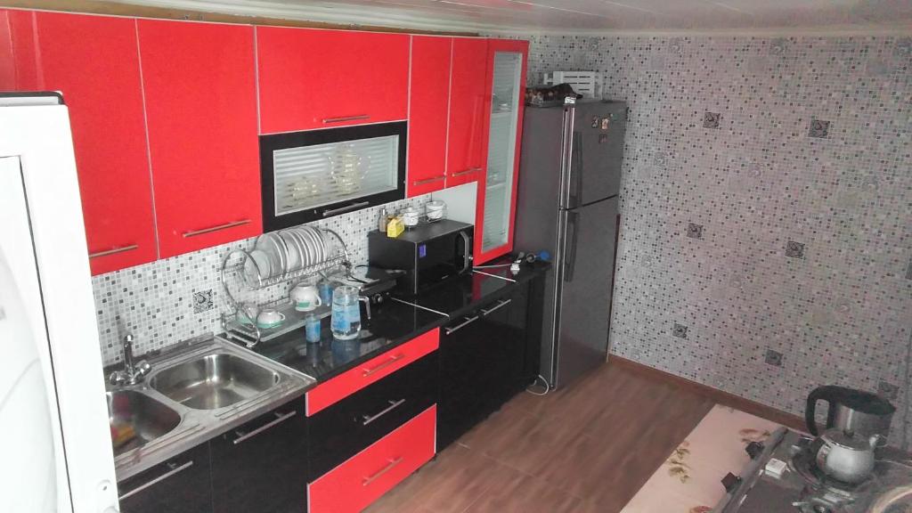 Kuchyň nebo kuchyňský kout v ubytování Tamila Guest House