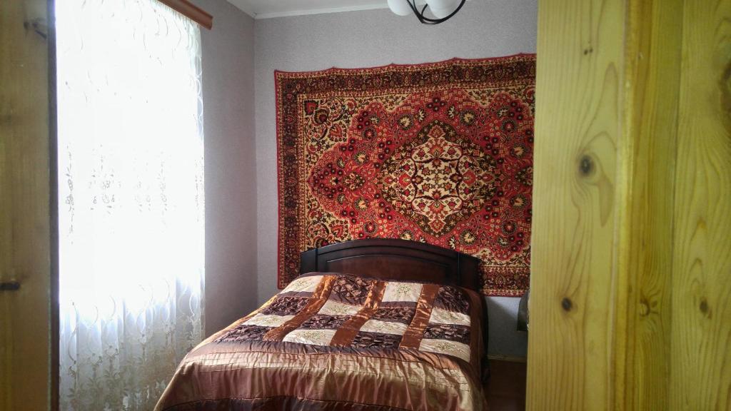 Postel nebo postele na pokoji v ubytování Tamila Guest House