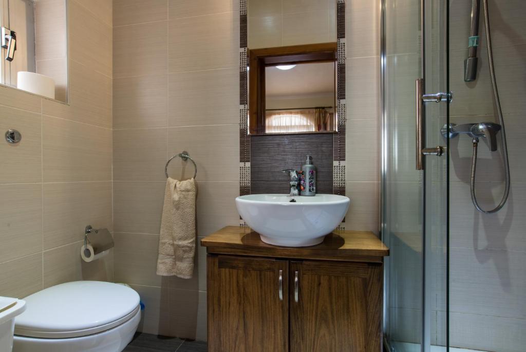 Koupelna v ubytování SeaFront Apartment Marsascala