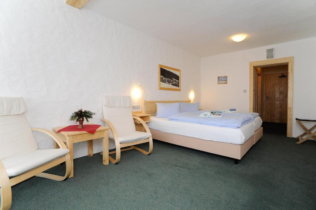 Postel nebo postele na pokoji v ubytování Erlebachova Bouda, hotel - Resort Svatý František