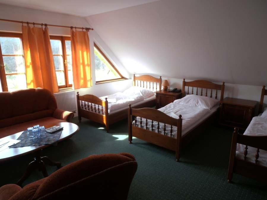 Postel nebo postele na pokoji v ubytování Hotel Klor