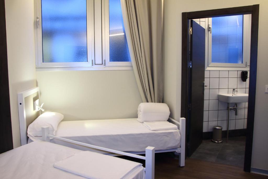 Postel nebo postele na pokoji v ubytování Poshtel Bilbao - Premium Hostel