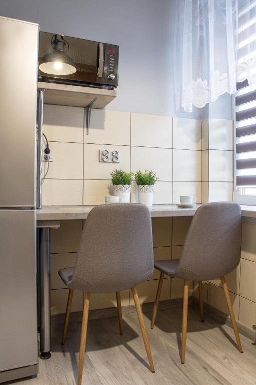 Kuchyňa alebo kuchynka v ubytovaní Apartments Gradowa