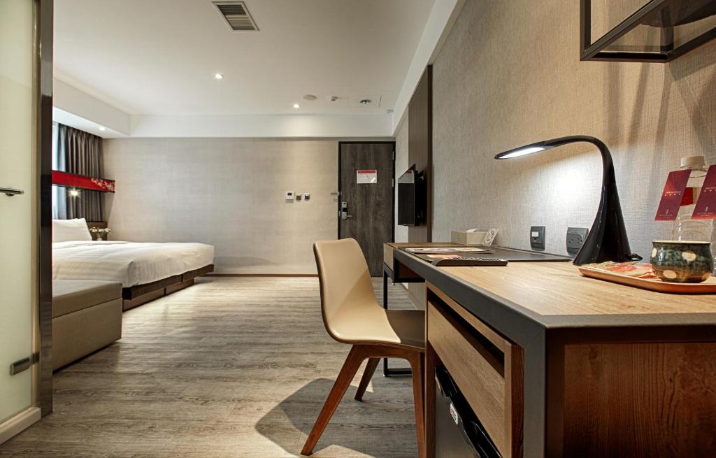 Postel nebo postele na pokoji v ubytování City Place Hotel