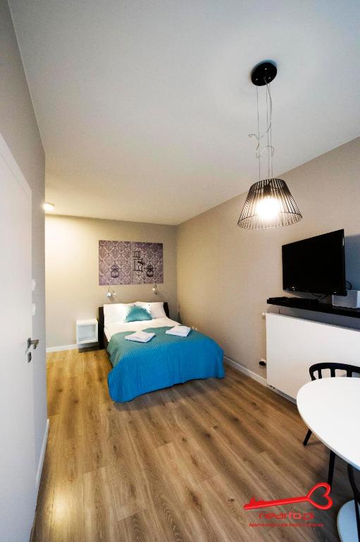 Posteľ alebo postele v izbe v ubytovaní Apartments Nearto Old Town Rakowicka